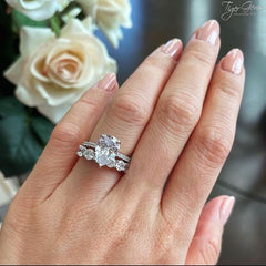 3.25 ctw Pear Accented Solitaire Ring