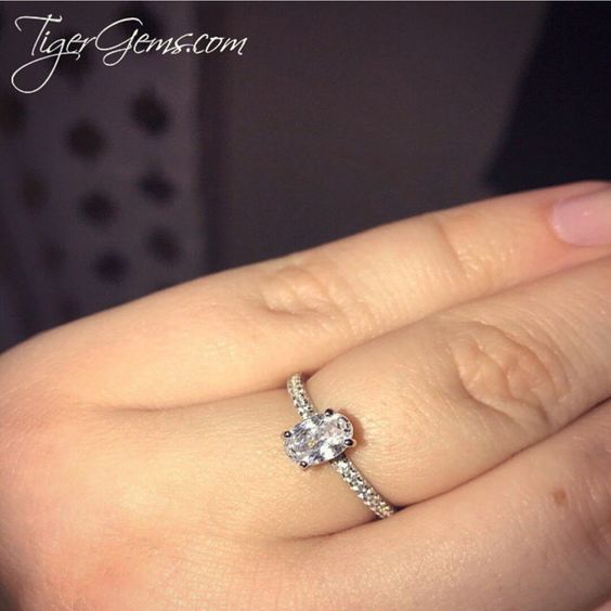 3/4 ctw Oval Accented Solitaire Ring