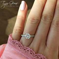 1.25 ctw Round Accented Solitaire Ring