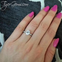 1.25 ctw Oval Accented Ring