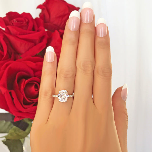 3.25 ctw Oval Accented Solitaire Ring