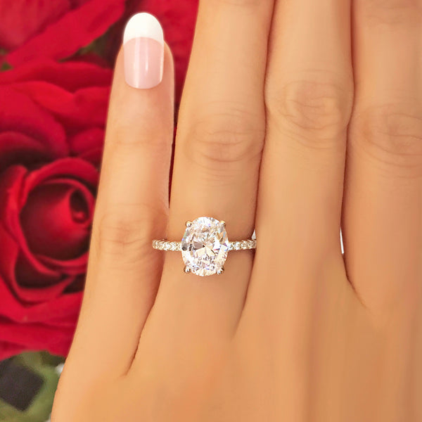 3.25 ctw Oval Accented Solitaire Ring