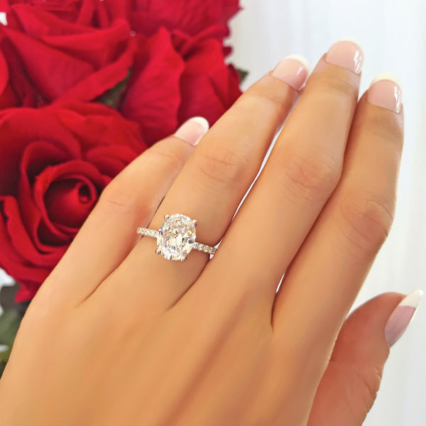 3.25 ctw Oval Accented Solitaire Ring