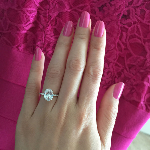 3.25 ctw Oval Accented Solitaire Ring
