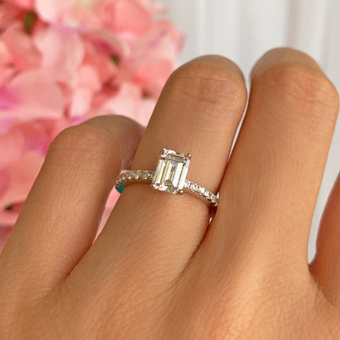 1.5 ctw Pear Accented Solitaire Ring