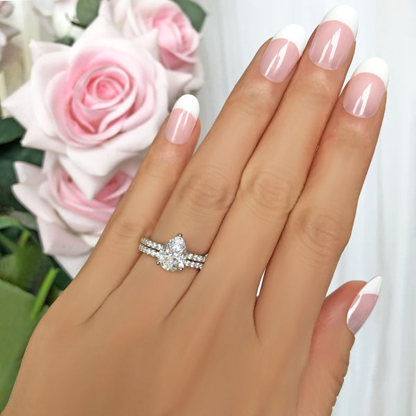 2 ctw Pear Accented Solitaire Set