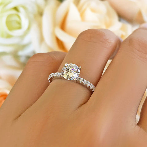 3.75 ctw Emerald Accented Solitaire Ring