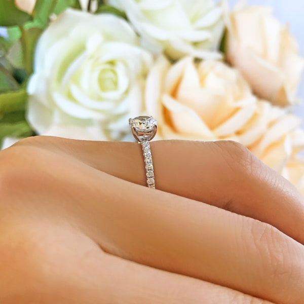 1.25 ctw Round Accented Solitaire Ring