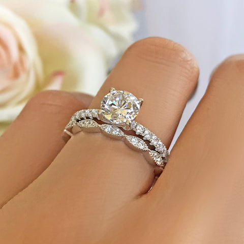 2 ctw Pear Accented Solitaire Set