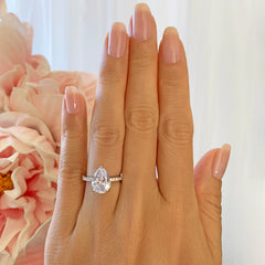 3.25 ctw Pear Accented Solitaire Ring