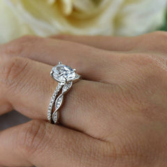 1.25 ctw Oval Accented Swirl Bridal Set