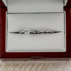 1.25 ctw Oval Accented Swirl Bridal Set